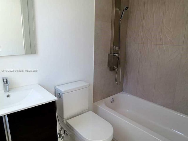 551 Michigan Ave Unit 125, Miami Beach, FL 33139 - full bathroom with toilet, vanity, and bathtub / shower combination
