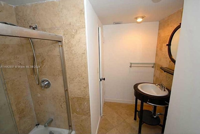 bathroom featuring sink and tile patterned flooring