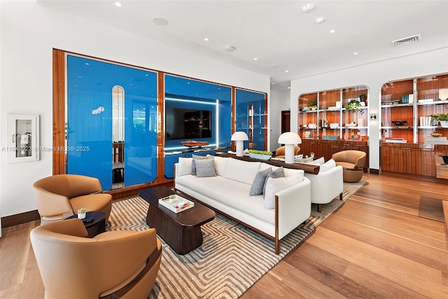 living room with hardwood / wood-style floors