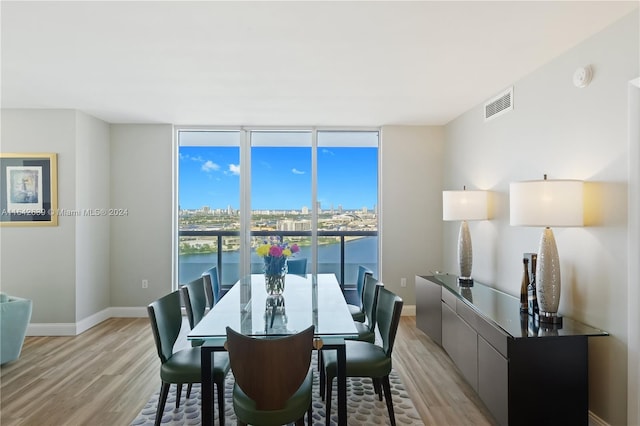 dining space featuring light hardwood / wood-style flooring