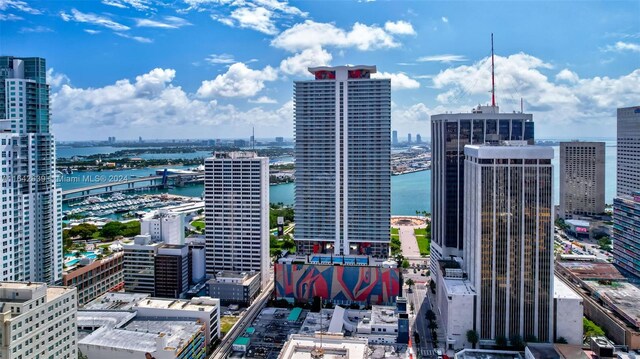 property's view of city featuring a water view