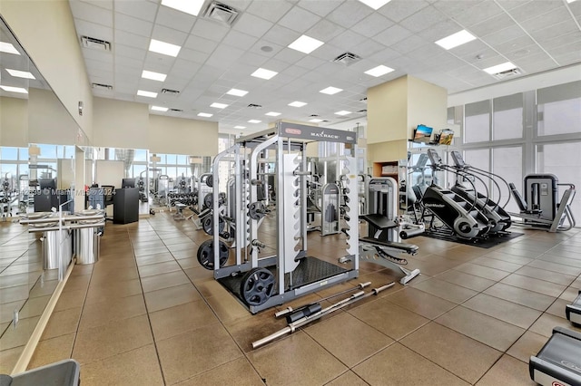 gym featuring a paneled ceiling