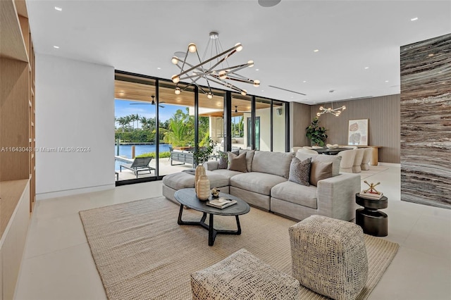 living room with a chandelier and a water view