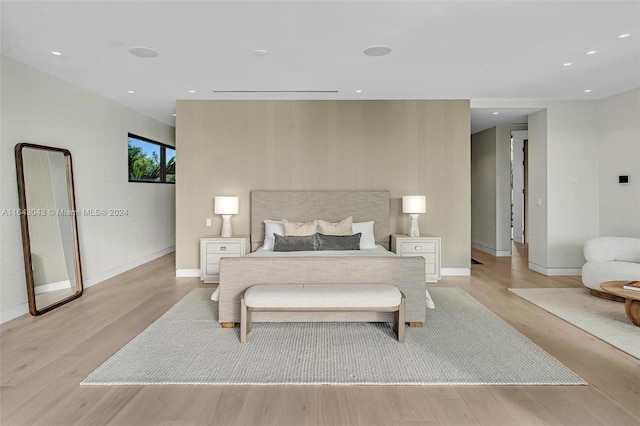 bedroom with light wood-type flooring