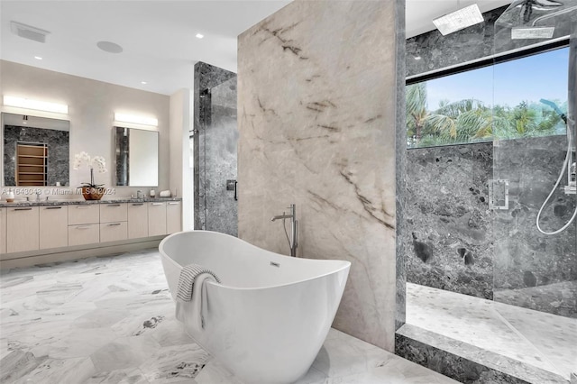 bathroom with tile walls, shower with separate bathtub, and vanity