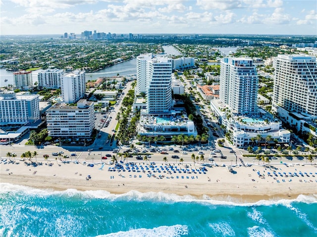 aerial view featuring a beach view and a water view