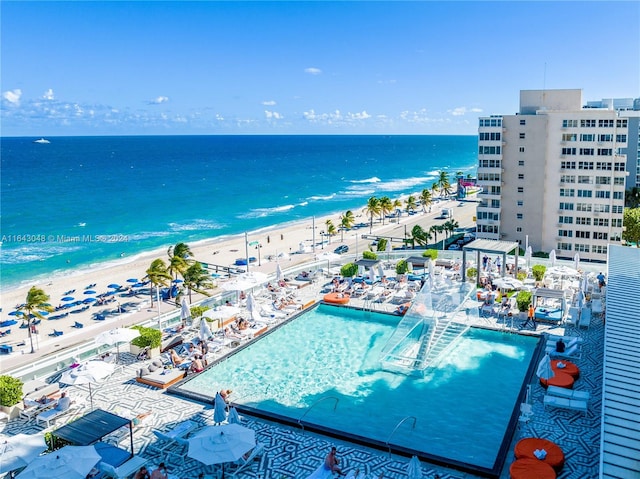 drone / aerial view with a view of the beach and a water view