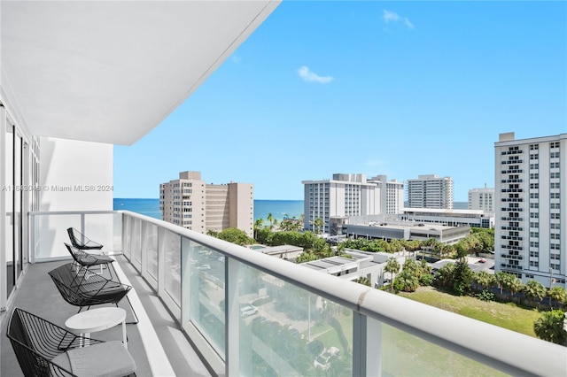 balcony featuring a water view