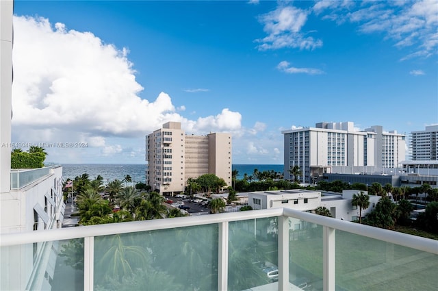 balcony featuring a water view