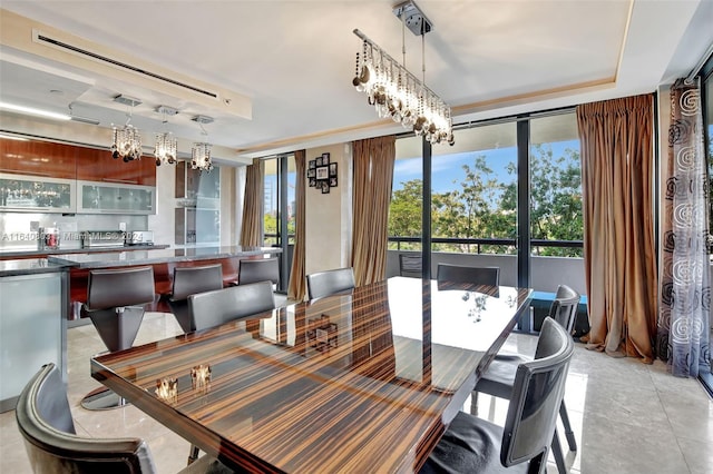 dining area featuring an inviting chandelier