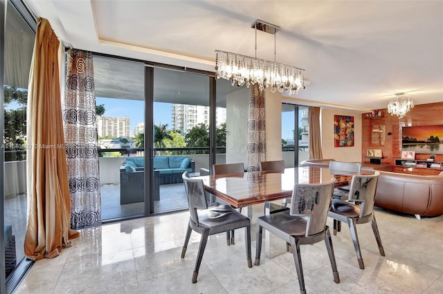 19667 Turnberry Way Unit 3E, Aventura, FL 33180 - dining space with a view of city and a notable chandelier