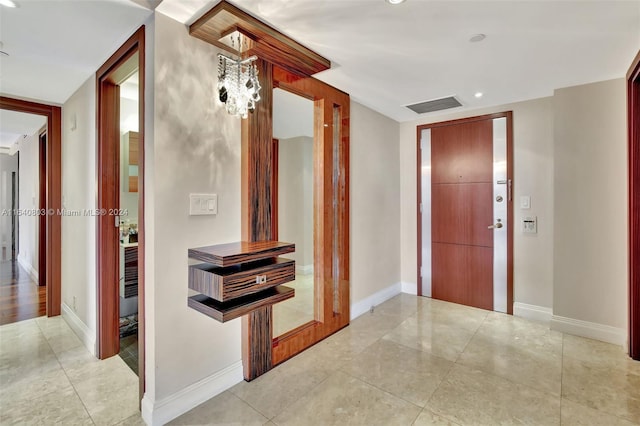 bathroom featuring tile walls, vanity, walk in shower, tile patterned flooring, and toilet