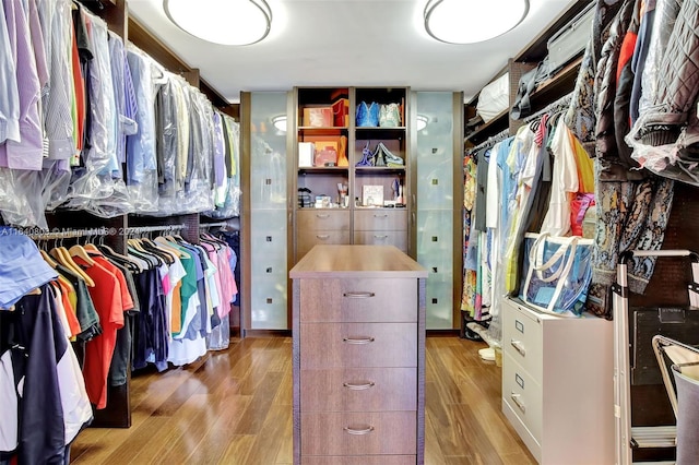 19667 Turnberry Way Unit 3E, Aventura, FL 33180 - walk in closet featuring wood finished floors