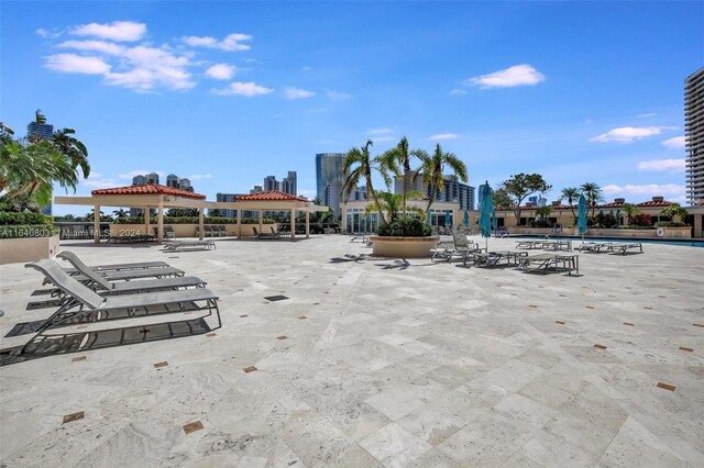 19667 Turnberry Way Unit 3E, Aventura, FL 33180 - surrounding community featuring a pool and a gazebo