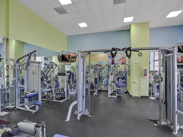 19667 Turnberry Way Unit 3E, Aventura, FL 33180 - gym with a drop ceiling and a high ceiling