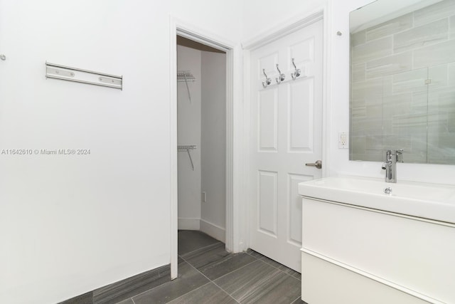 bathroom featuring tile patterned floors and vanity