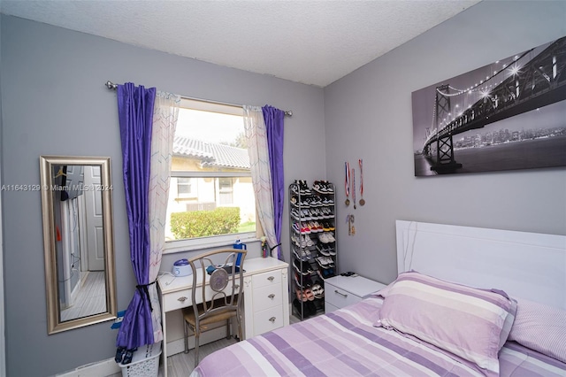 bedroom with a textured ceiling