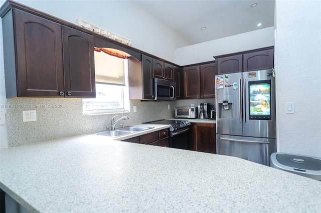 kitchen featuring decorative backsplash, dark brown cabinets, stainless steel appliances, and sink