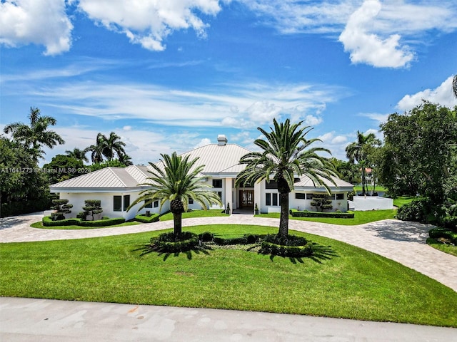 single story home with a front yard