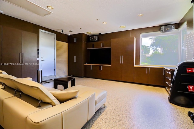 living area with recessed lighting