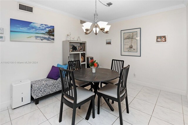 tiled dining room featuring a notable chandelier and crown molding