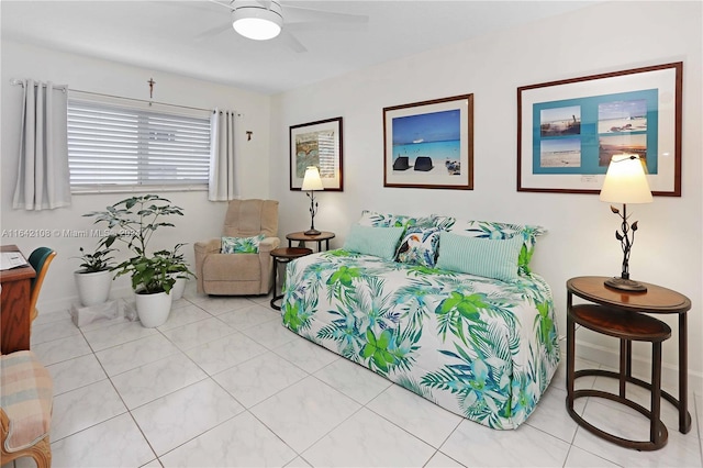 tiled bedroom with ceiling fan