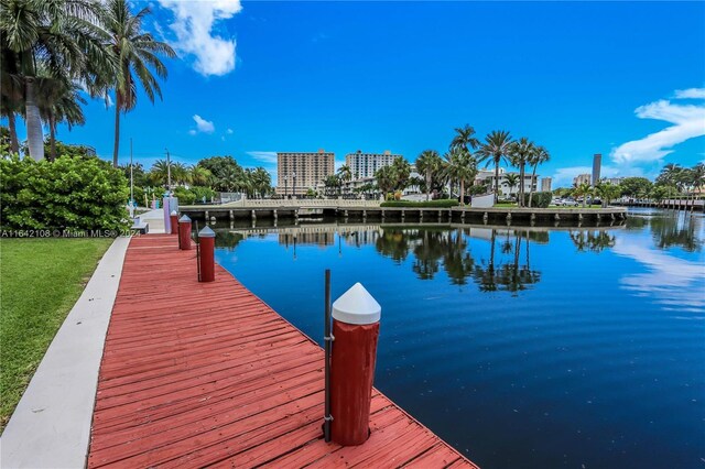 dock area featuring a water view