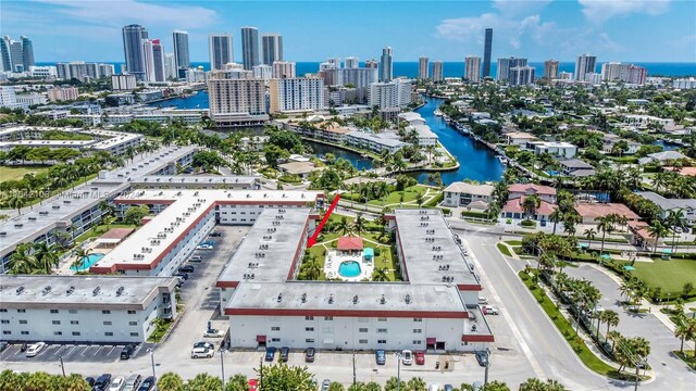 birds eye view of property featuring a water view