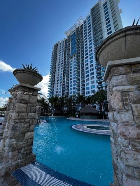 view of pool featuring pool water feature