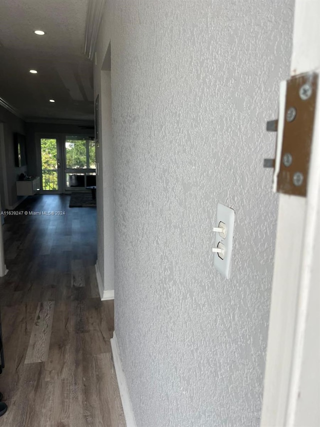 hall with dark wood-type flooring