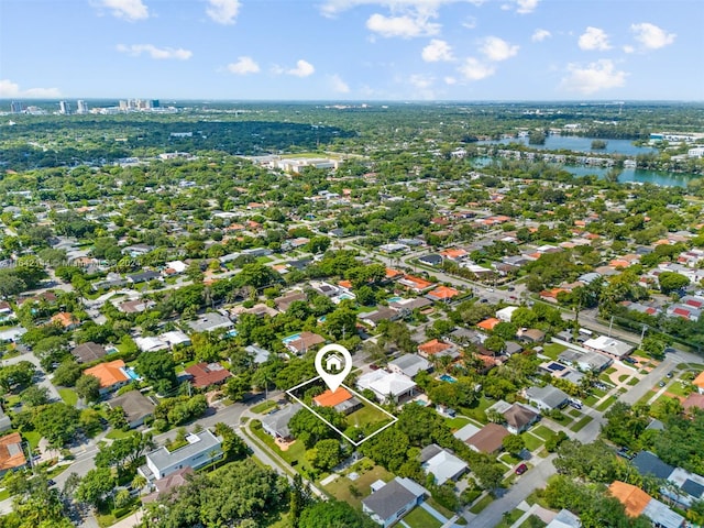 drone / aerial view with a water view