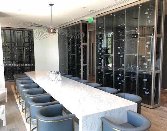 wine room featuring hardwood / wood-style flooring