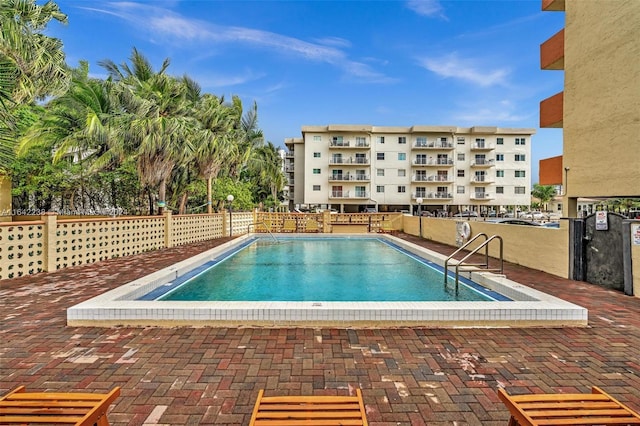 view of pool featuring a patio