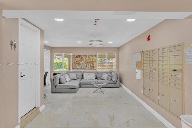 living room featuring a mail area