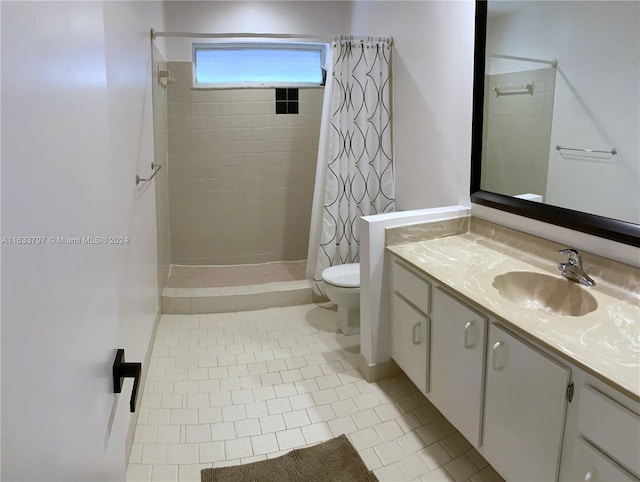 bathroom featuring tile patterned flooring, toilet, vanity, and walk in shower