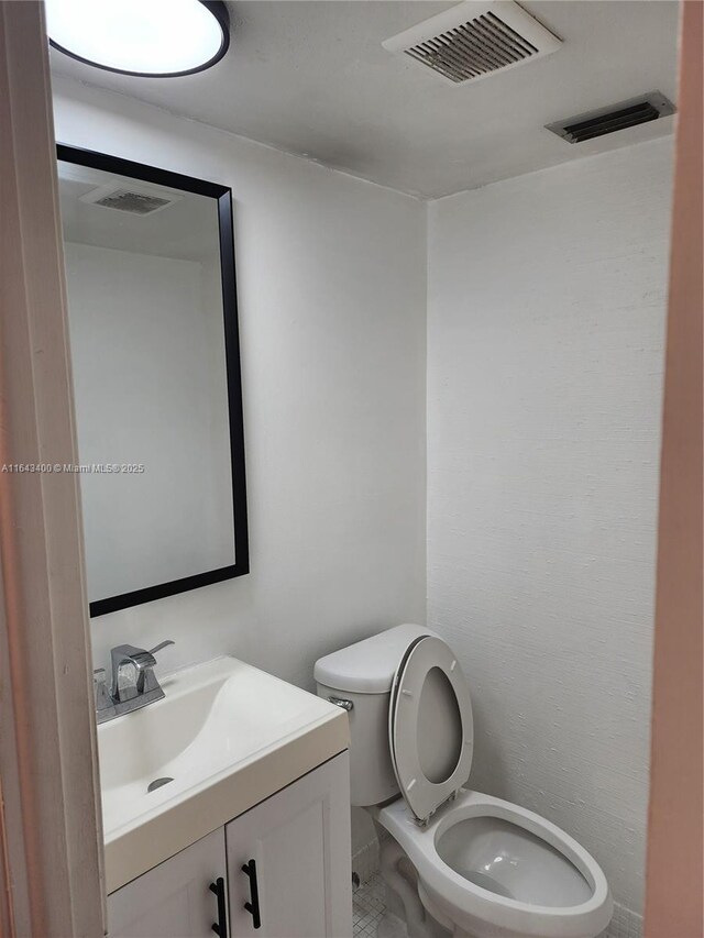 bathroom featuring tile patterned floors and vanity