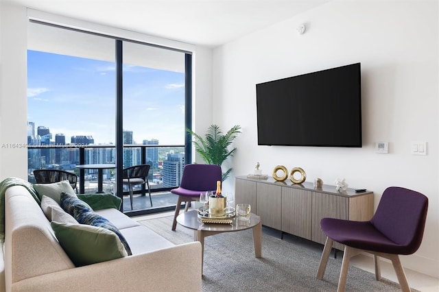 living room featuring floor to ceiling windows