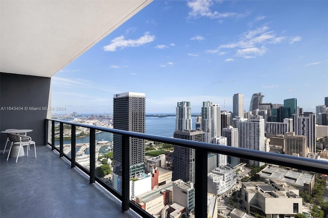 balcony featuring a water view