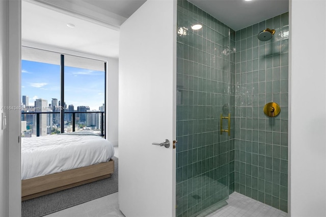 bathroom featuring tile patterned flooring and walk in shower