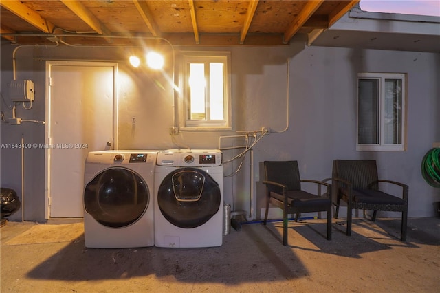 laundry area with washing machine and dryer