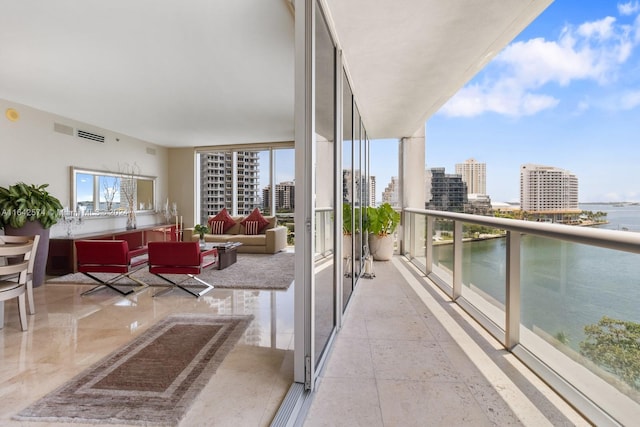 495 Brickell Ave Unit 901, Miami, FL 33131 - balcony with a view of city, an outdoor hangout area, and visible vents