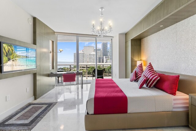 tiled bedroom featuring a wall of windows and a chandelier