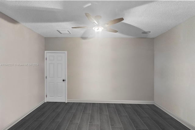 unfurnished room featuring a textured ceiling, ceiling fan, and hardwood / wood-style flooring