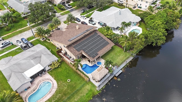 drone / aerial view with a water view