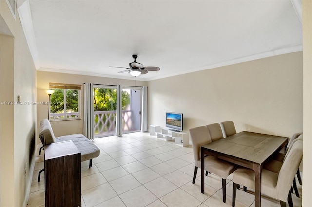 living room with ceiling fan, light tile patterned floors, and ornamental molding