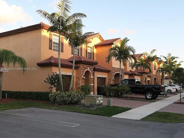 view of building exterior with a garage