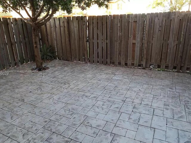 view of patio terrace at dusk