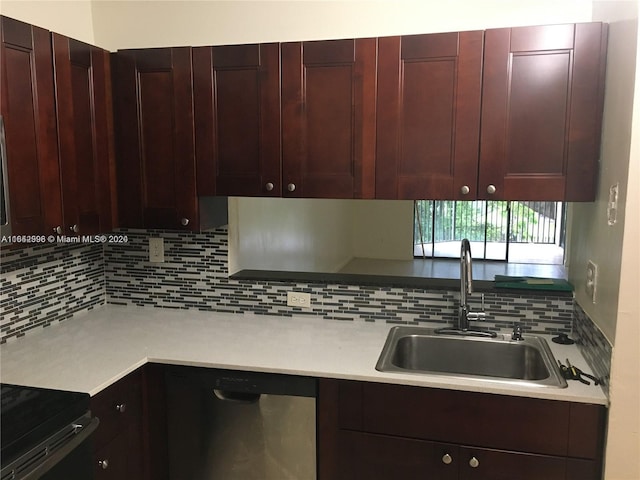 kitchen featuring sink, dishwasher, range, and tasteful backsplash