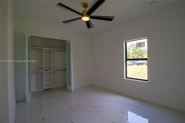 unfurnished bedroom with ceiling fan, a closet, and light tile patterned floors