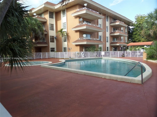 17530 NW 68th Ave Unit C4002, Hialeah, FL 33015 - community pool featuring a patio area
